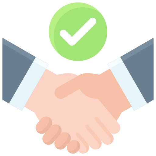 A detailed view of a handshake between two individuals, symbolizing agreement and collaboration.